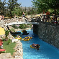 Limnoupolis Water Park lazy river bridge