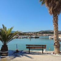 Kalives Harbour and bench.