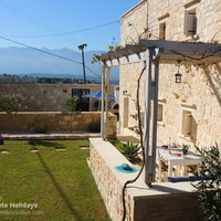 13 Athina garden, dining area and mountain view