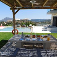 11 Boutique House dining area and lounge and pool terrace.