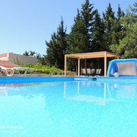 08 Giorgos pool terrace with covered dining area