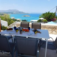 08 Villa Jeni front covered dining terrace with sea view.