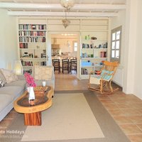 11 Perdika living room with fireplace.